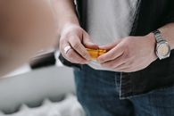 A Person Holding a Cartridge of Film