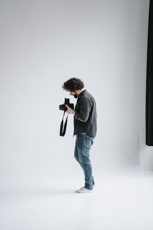 A Photographer Looking at the Camera