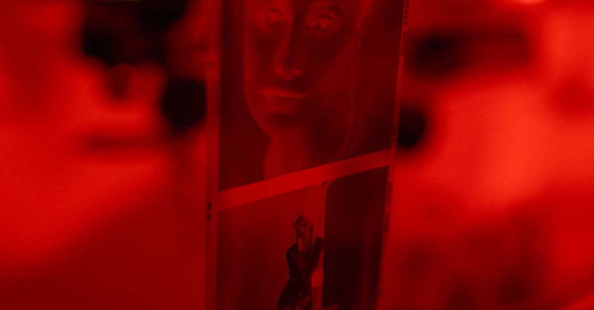 Womans Face in Red Frame · Free Stock Photo