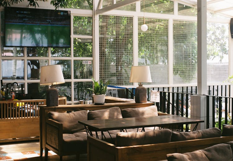 Cozy Cafeteria Interior With Outdoor Garden