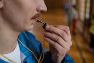 Person Ready to Blow a Whistle
