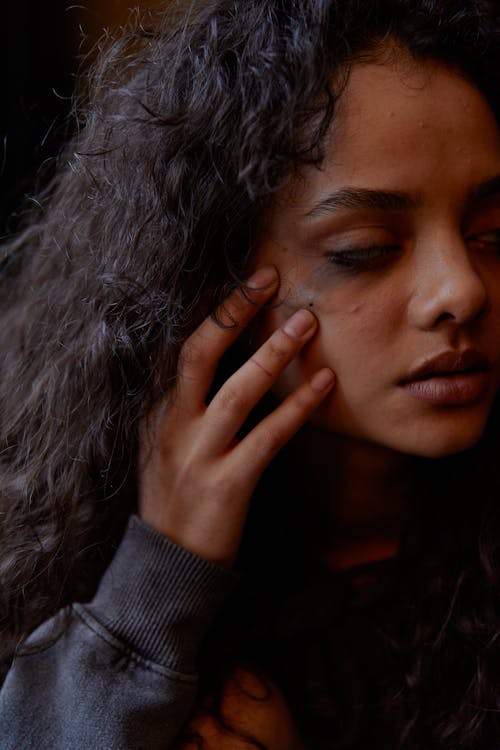 Close-Up Shot of a Woman Looking Depressed