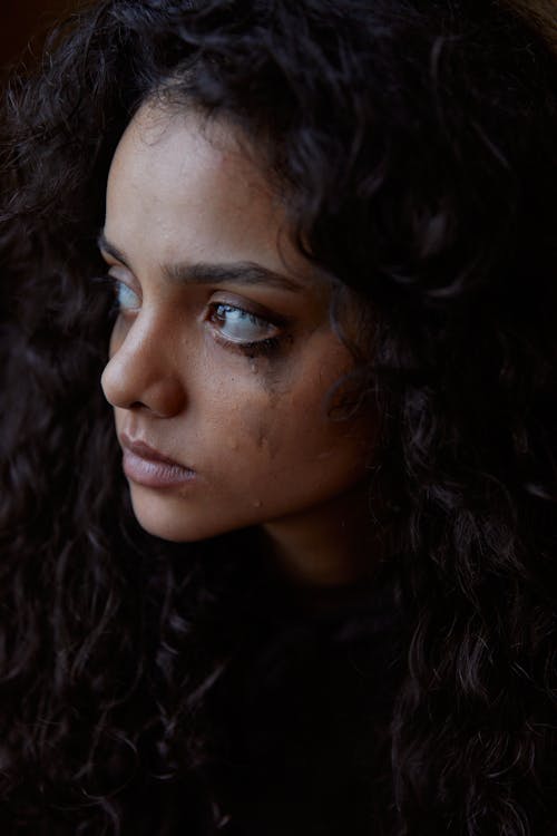 Close-Up Shot of a Woman Looking Depressed
