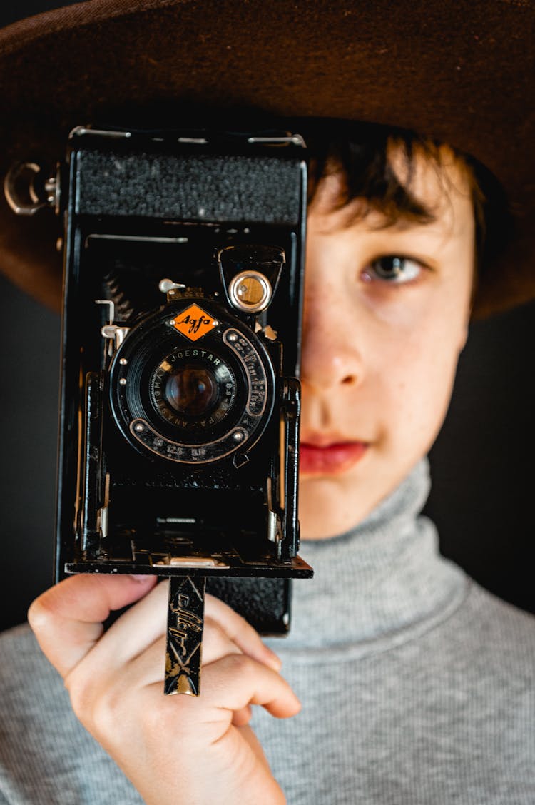 Stylish Boy With Retro Photo Camera