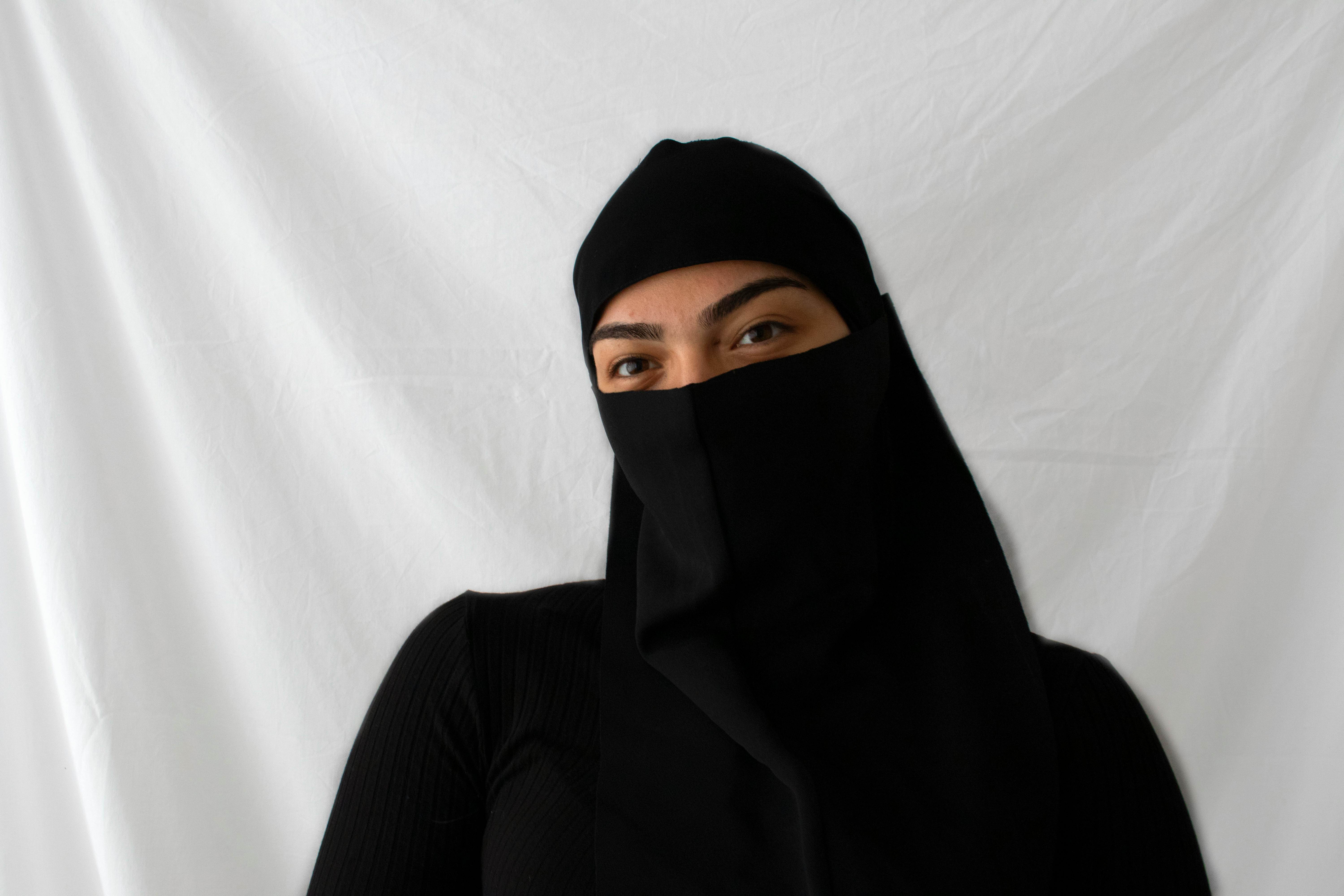 Woman in White Shirt Wearing Black Hijab · Free Stock Photo