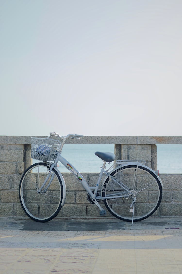 Bicycle Standing At Wall Of Seaside Boulevard