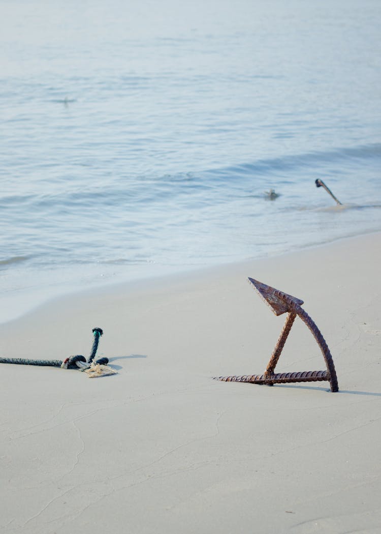 A Buried Steel Anchor On The Shore