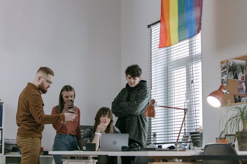 Free Employees Having a Discussion Stock Photo