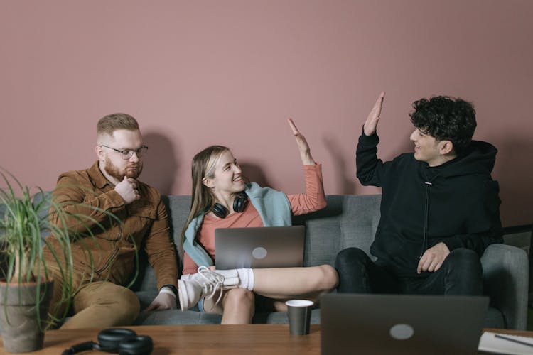 People Sitting On The Sofa