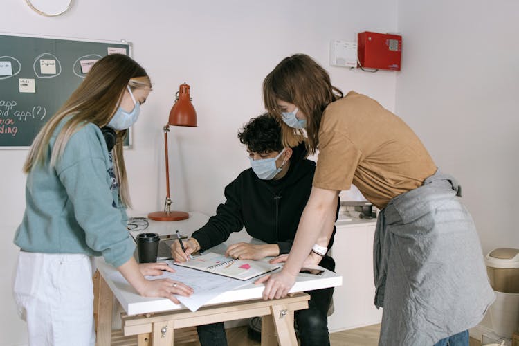 A Group Of People Having A Discussion