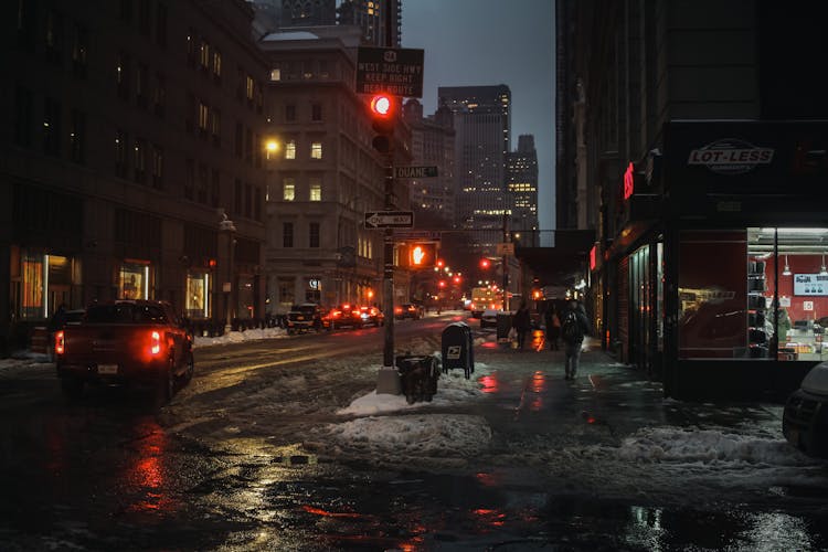 Traffic On City Street At Night