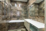 Contemporary light bathroom with bathtub