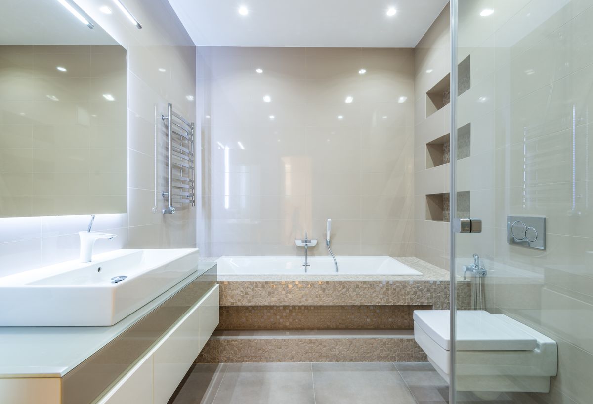 wet room with linear drain and waterproof tiled floor