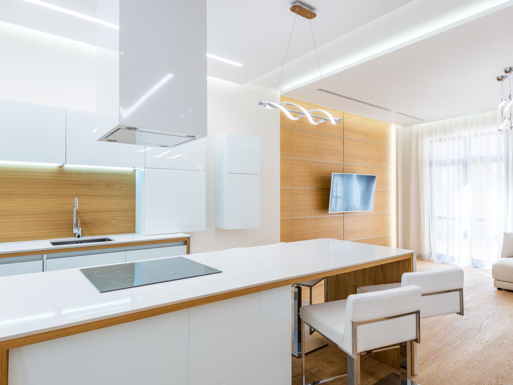 Kitchen Spraying in Hampton — careful masking before painting begins