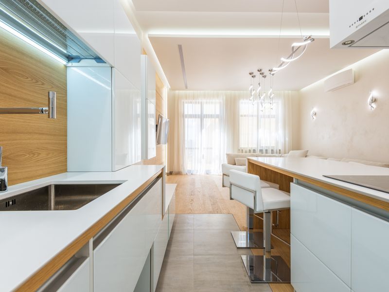 Bright kitchen with white and timber cabinetry