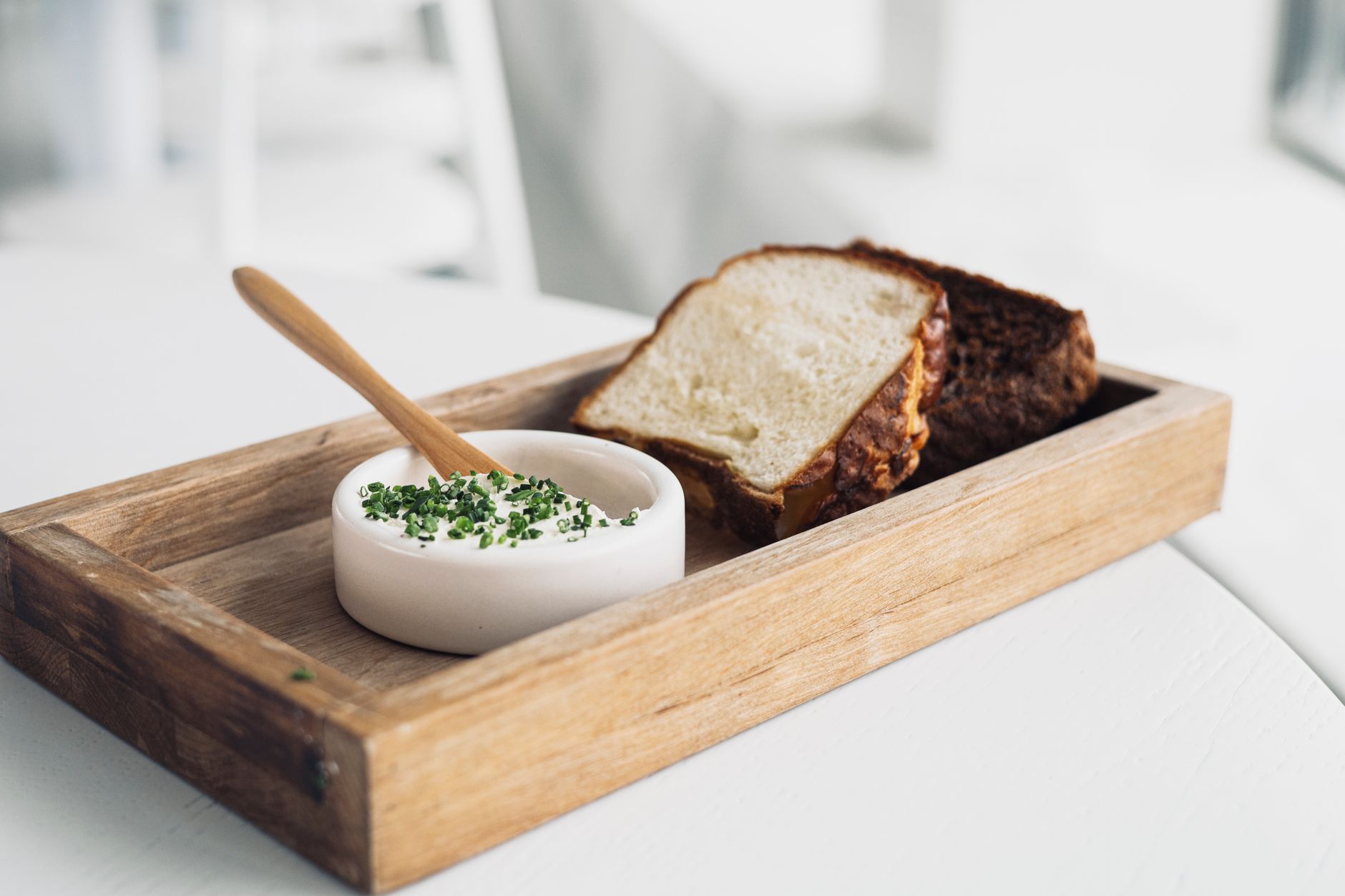 Horseradish and ingredients on wooden board