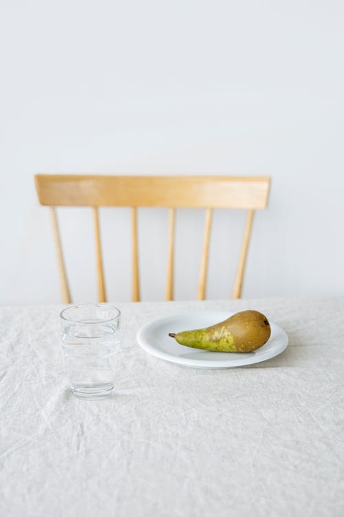 Sliced Apple on White Ceramic Plate