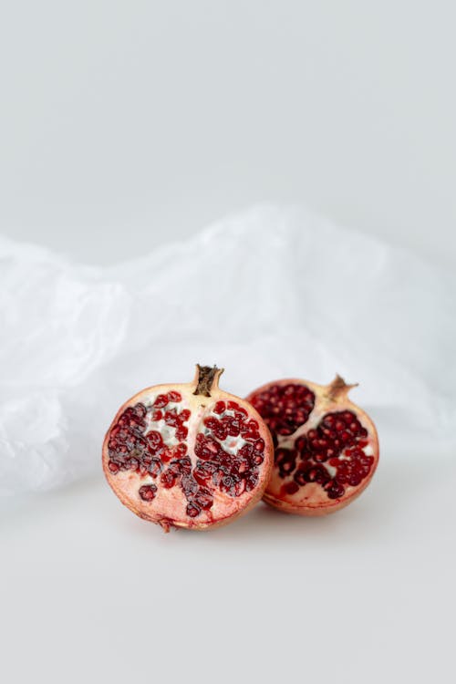 Red Round Fruit on White Textile