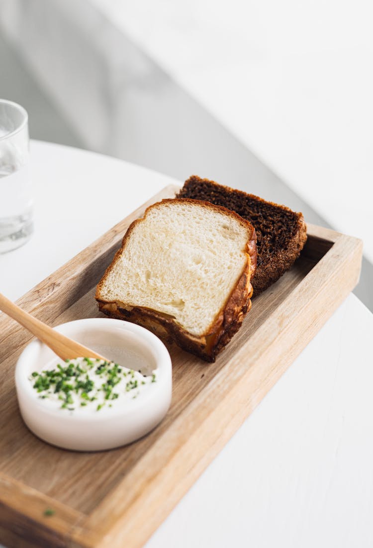 Slice Bread And Filling On A Wooden Tray