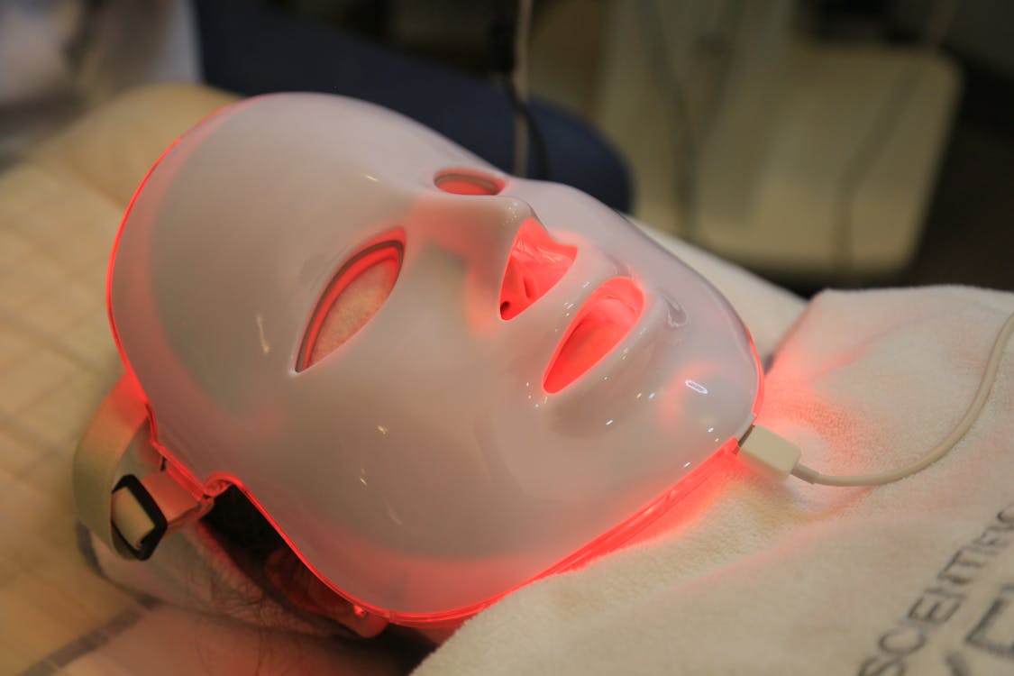 Free Close-up of a Person with an LED Face Mask On  Stock Photo