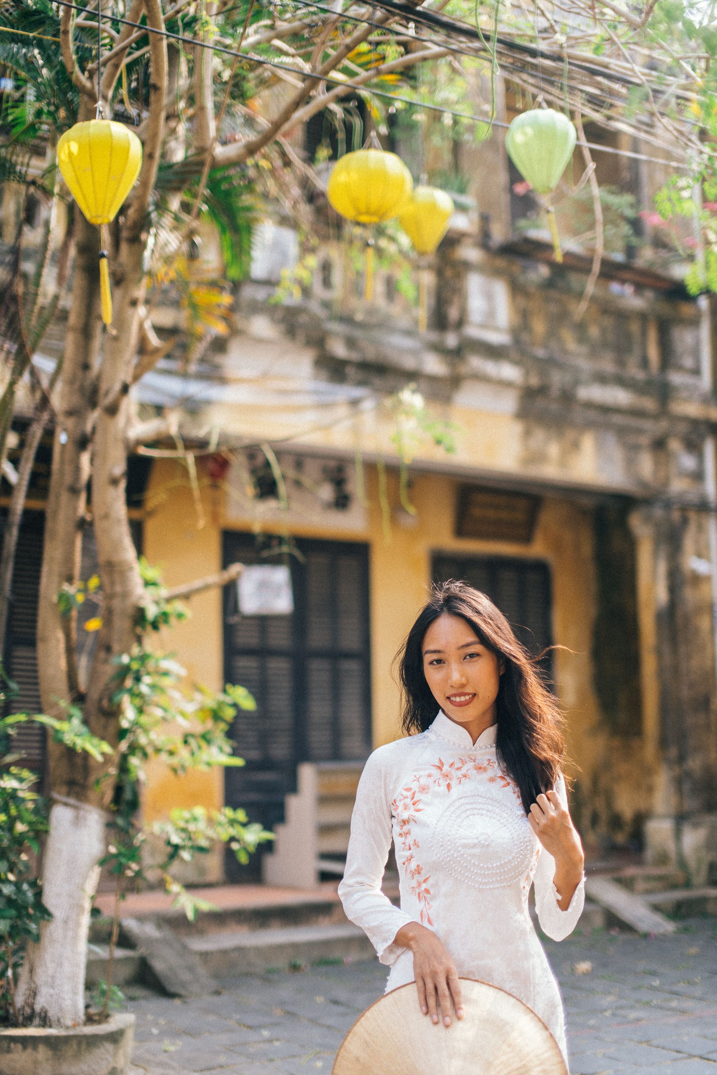 Woman Posing Under a Tree · Free Stock Photo