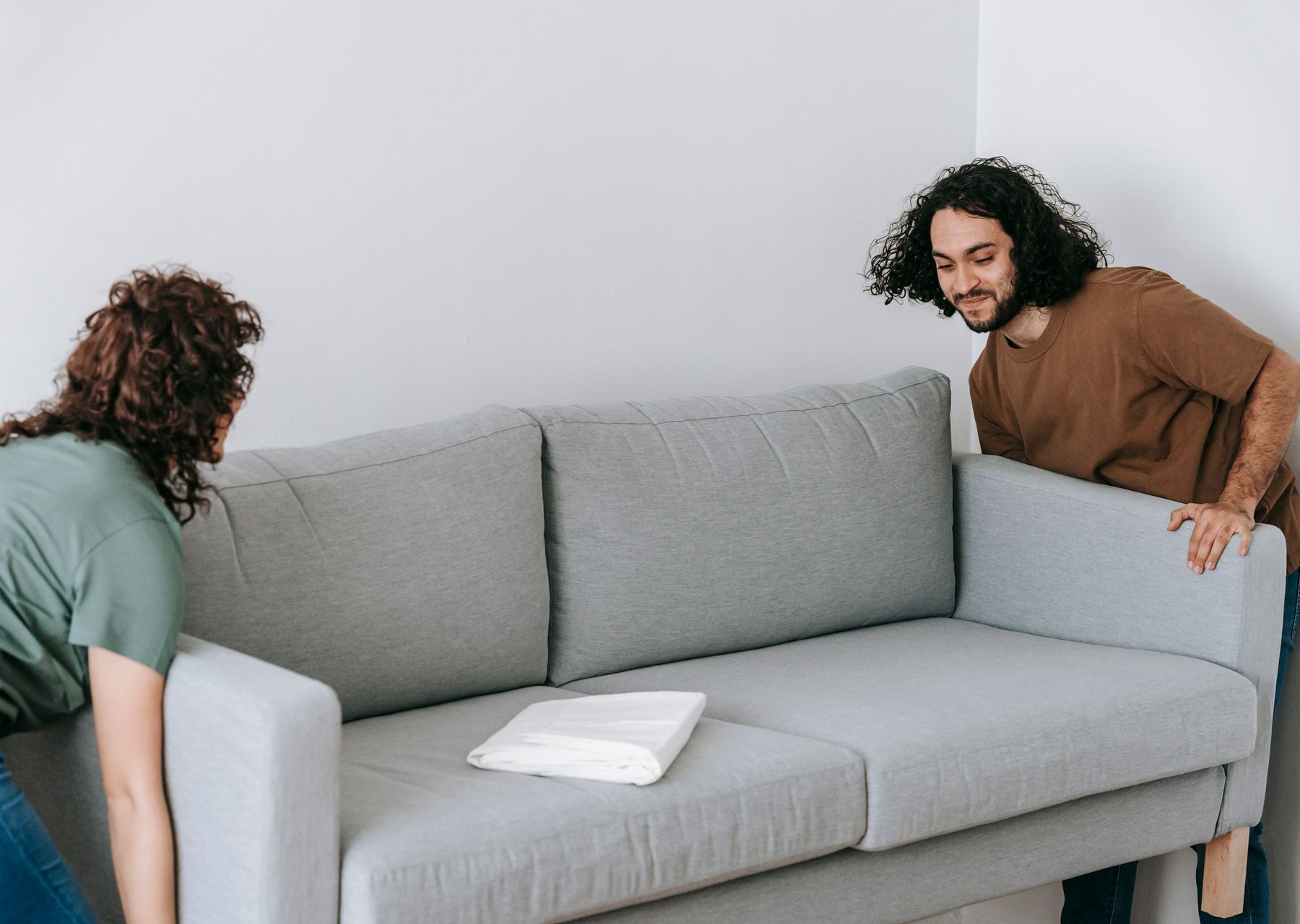 Packing services in Wells — crew wrapping and loading on moving day