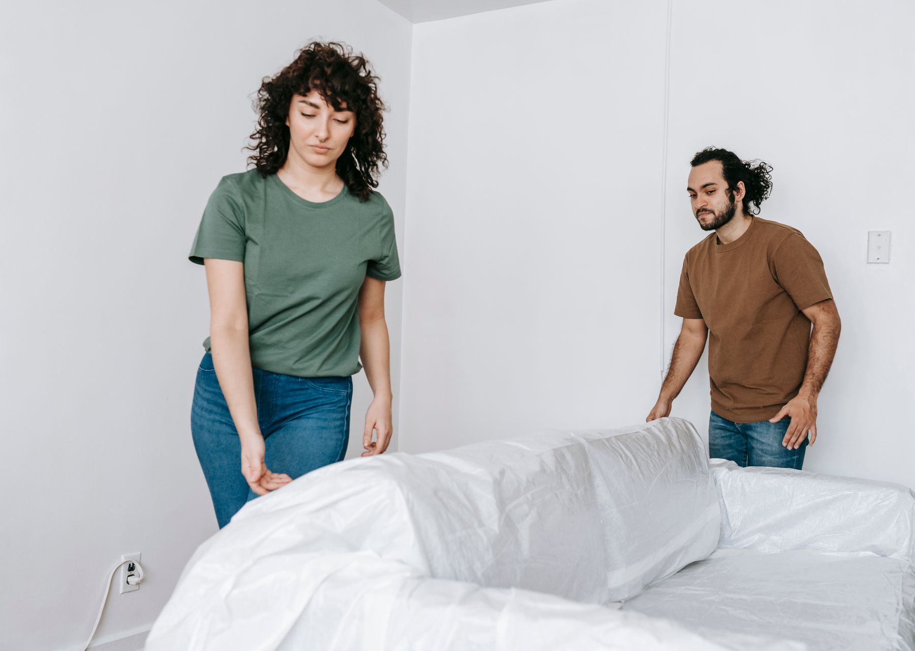Packing services in Laurieston — crew wrapping and loading on moving day