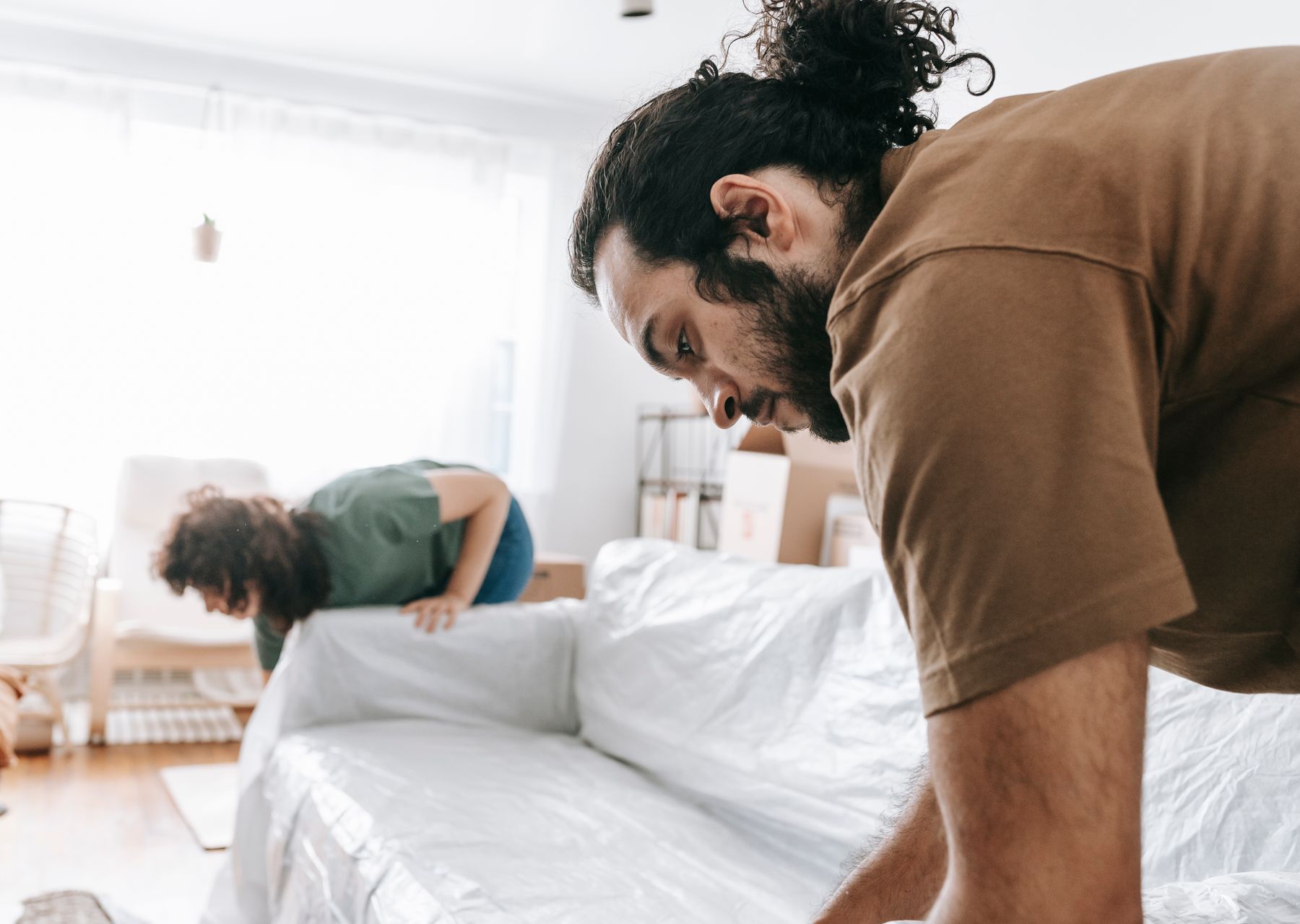 House removals anywhere in the UK — crew wrapping and loading on moving day