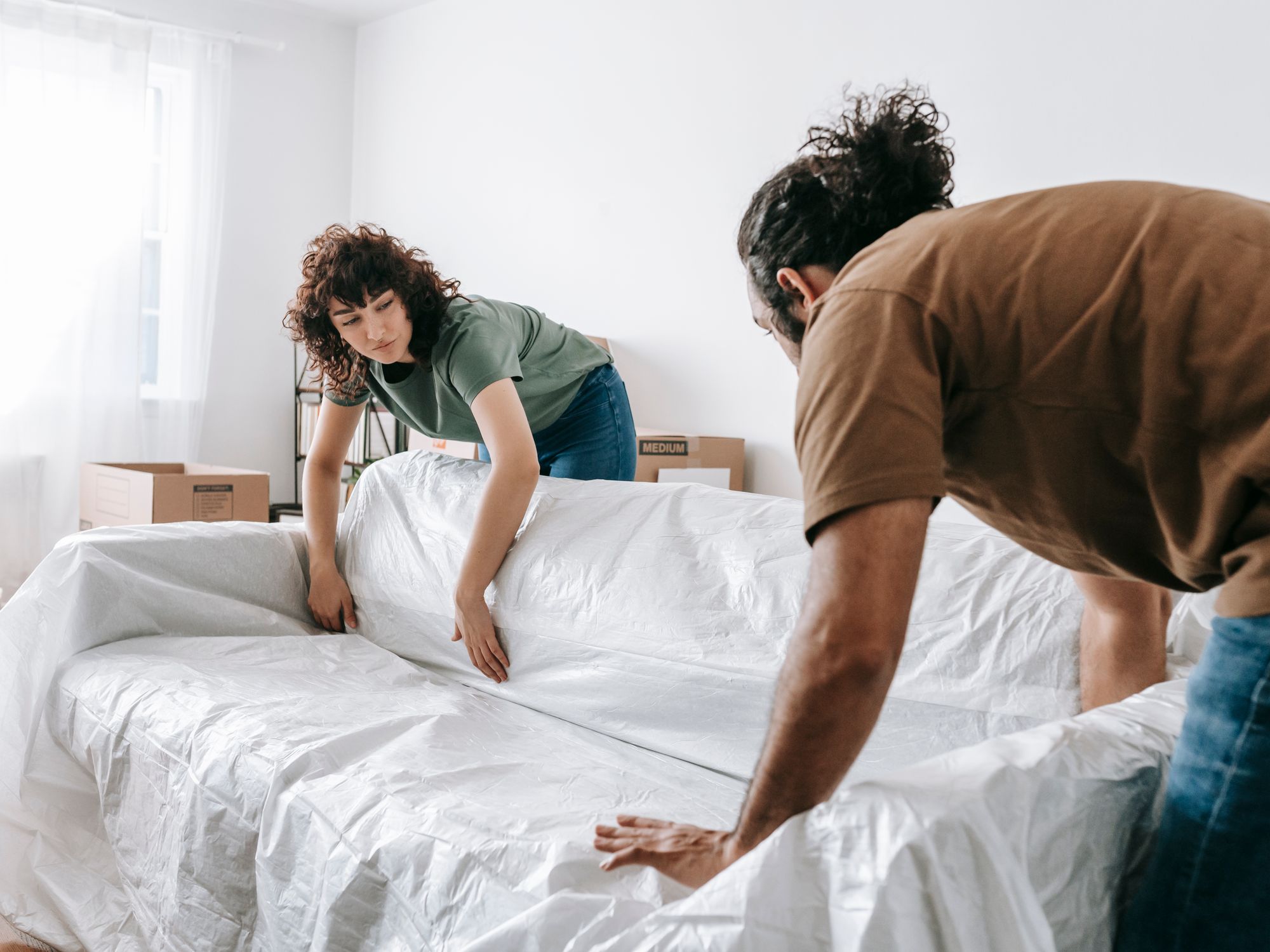 House Removals in Fawkham, M25 Fringe — professional movers carrying furniture on a house move