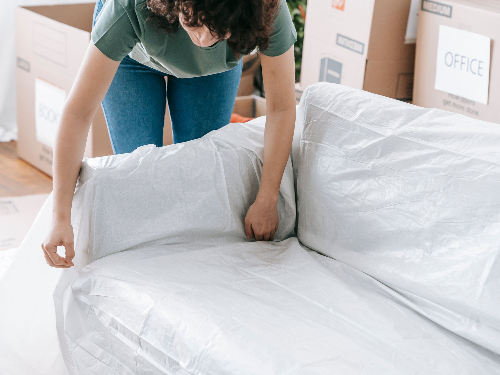 Flat Removals in Botany Bay, North London — movers carrying boxes for a flat move