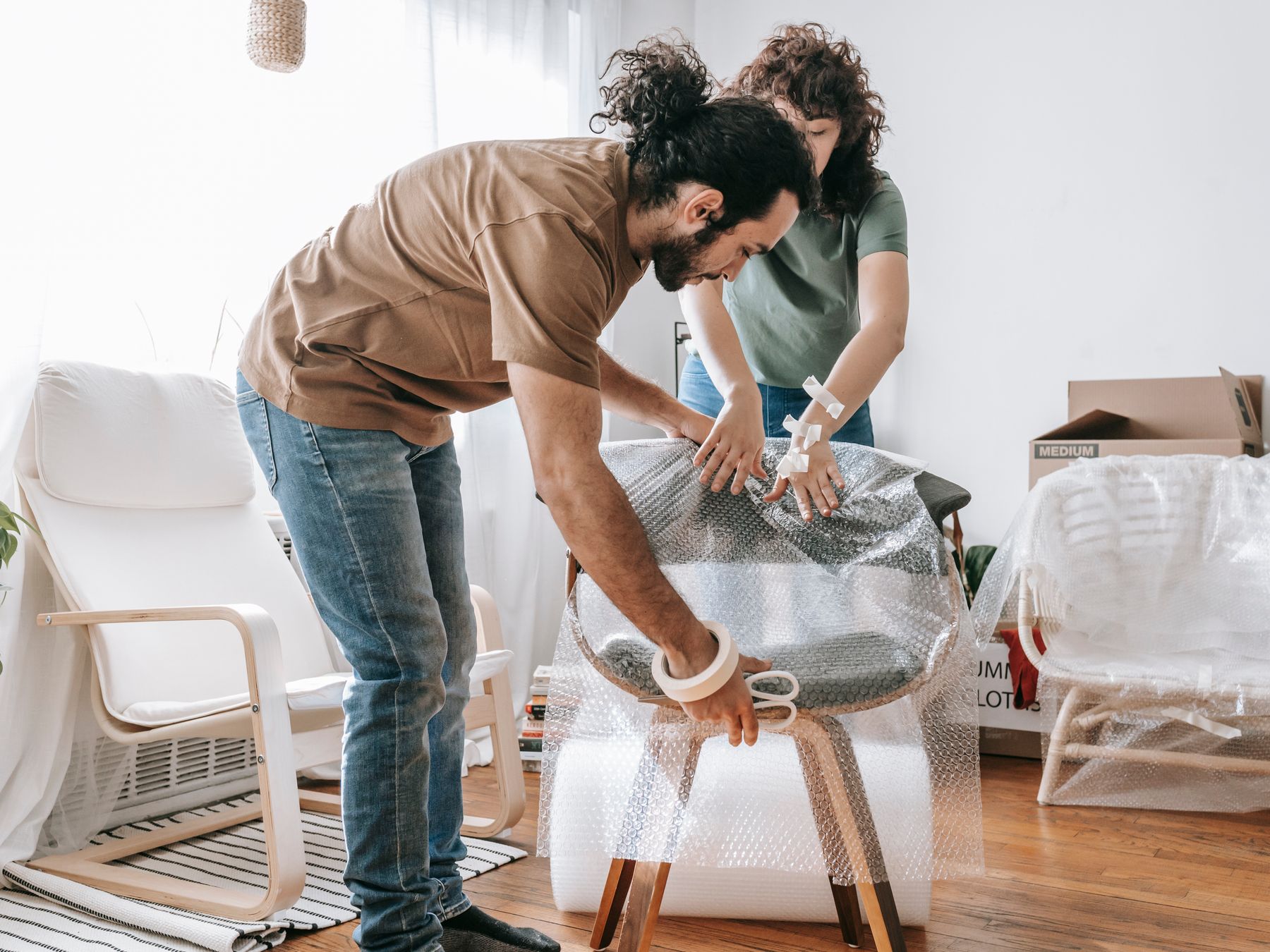 Kingston Riverside — professional packers wrapping and boxing belongings