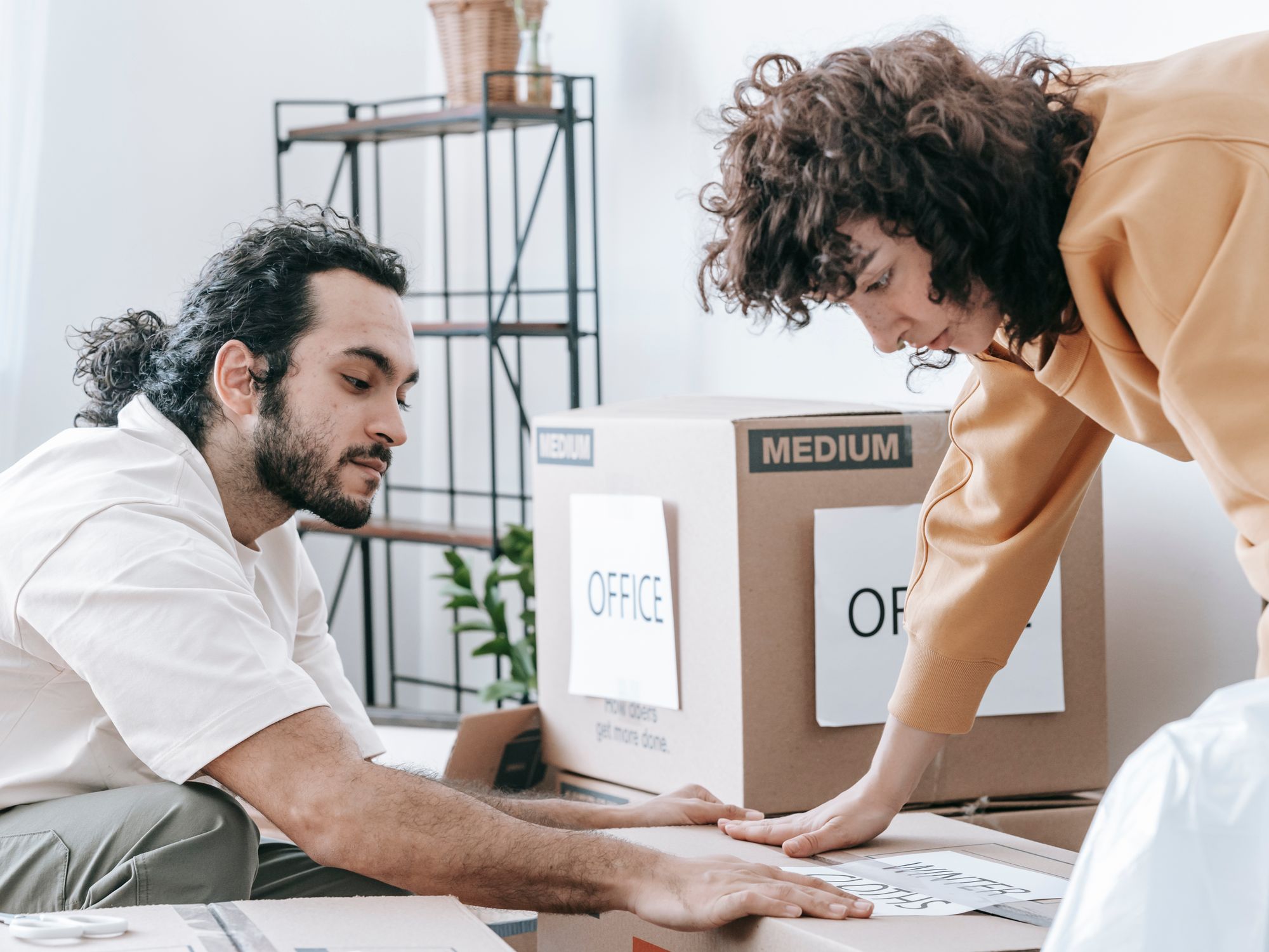 Flat Removals in Warwick, West Midlands — movers carrying boxes for a flat move