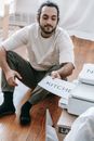 Man Printing Labels For Boxes
