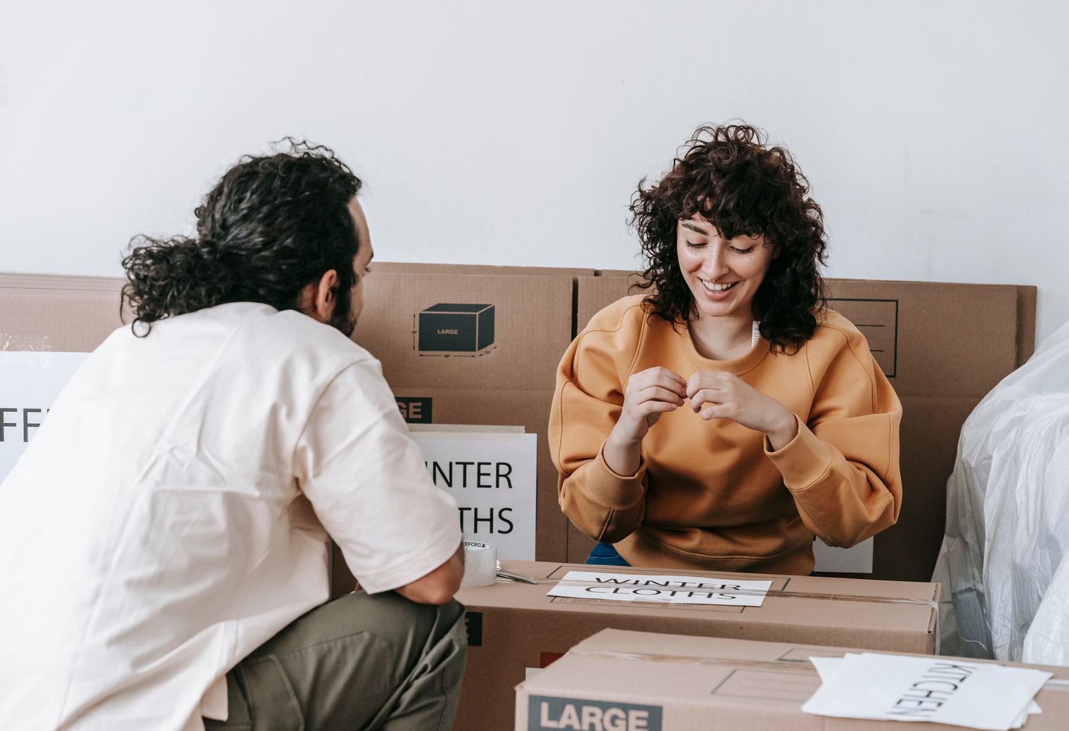 Sharpness — movers carrying boxes for a flat move