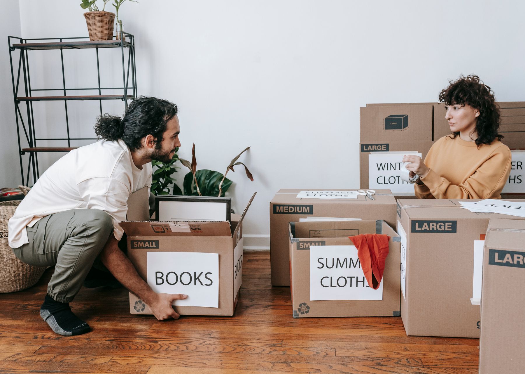Removals and storage in Risca — crew wrapping and loading on moving day