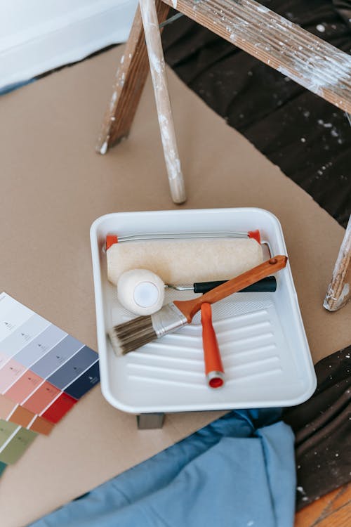 Free Paint Roller And Brush On A Tray Stock Photo