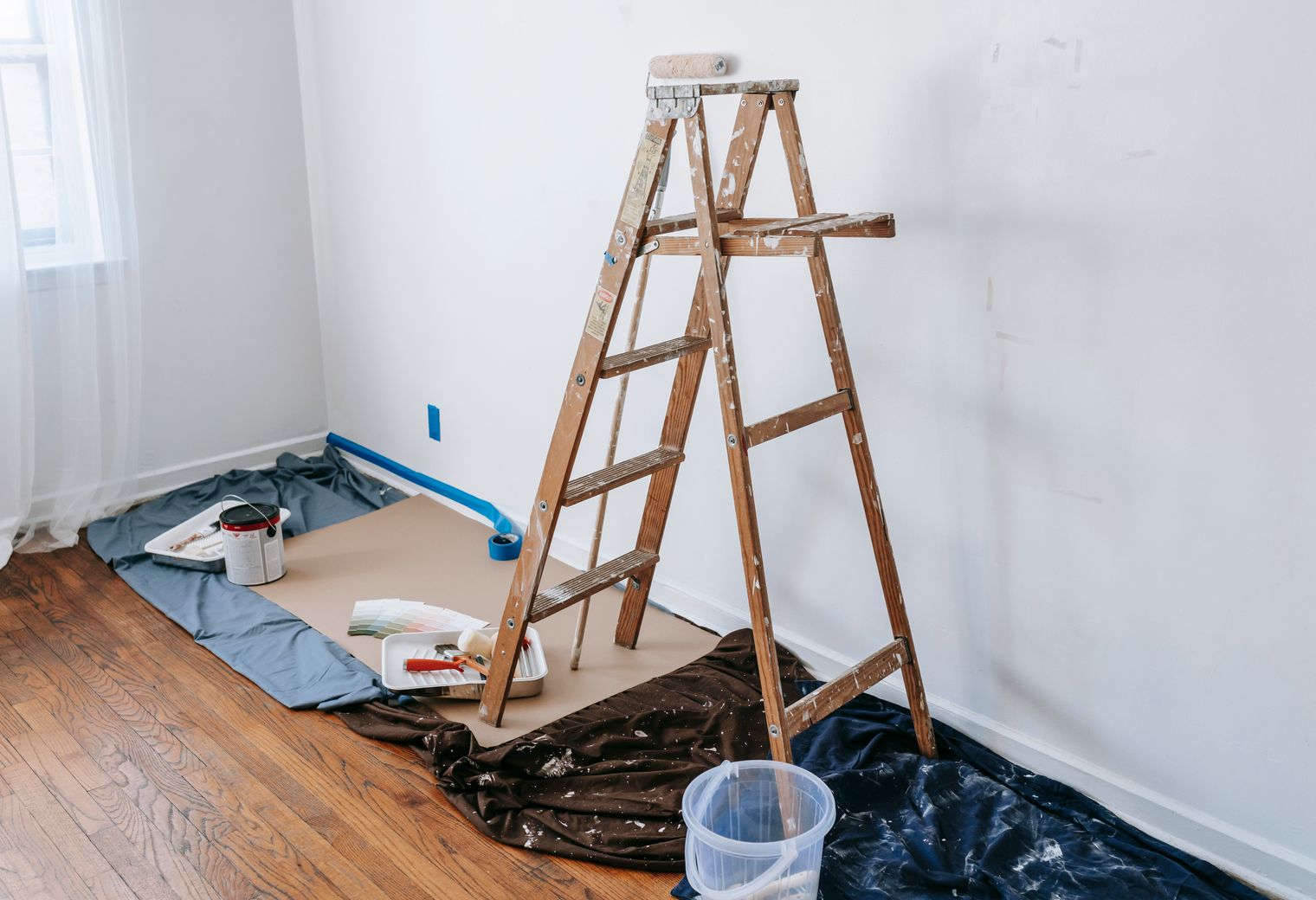 Painters and Decorators in Rainham — dust sheets down and the room fully protected