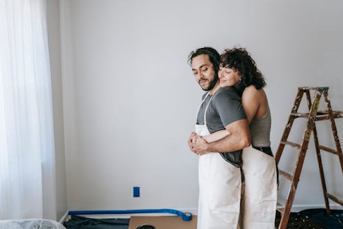 A Couple Being Romantic While Working