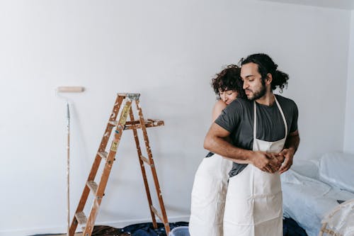 A Couple Being Romantic While Working