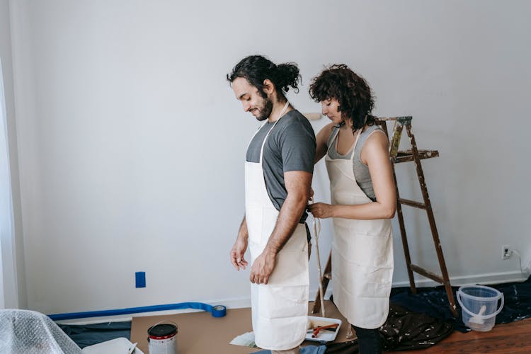 A Couple Wearing Their Work Clothes