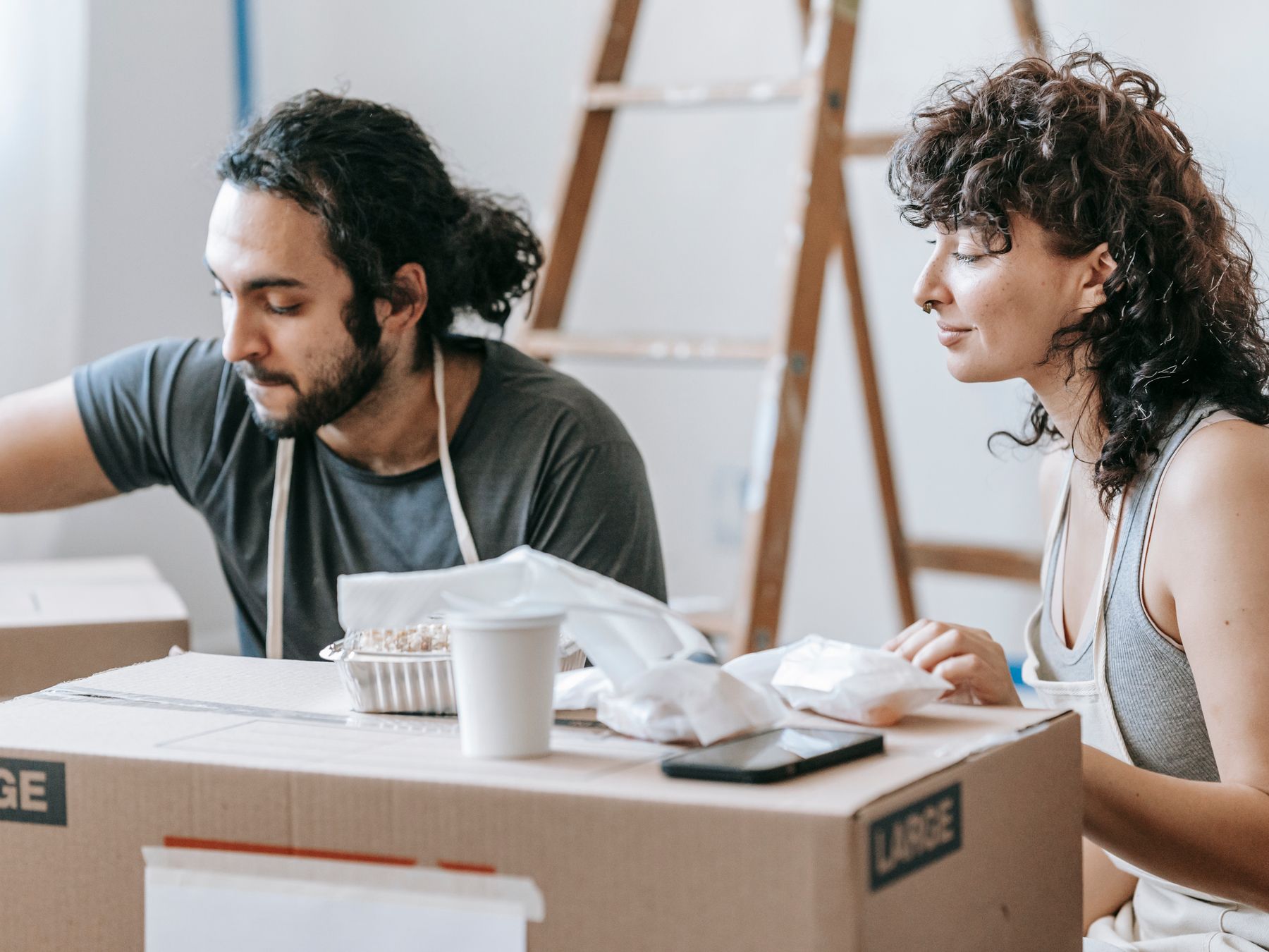 Stepney — professional packers wrapping and boxing belongings