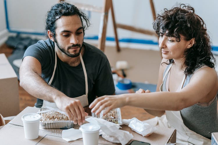 A Couple Having Packed Food 