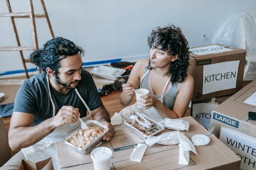 Free Couple Eating And Having Break Time Stock Photo
