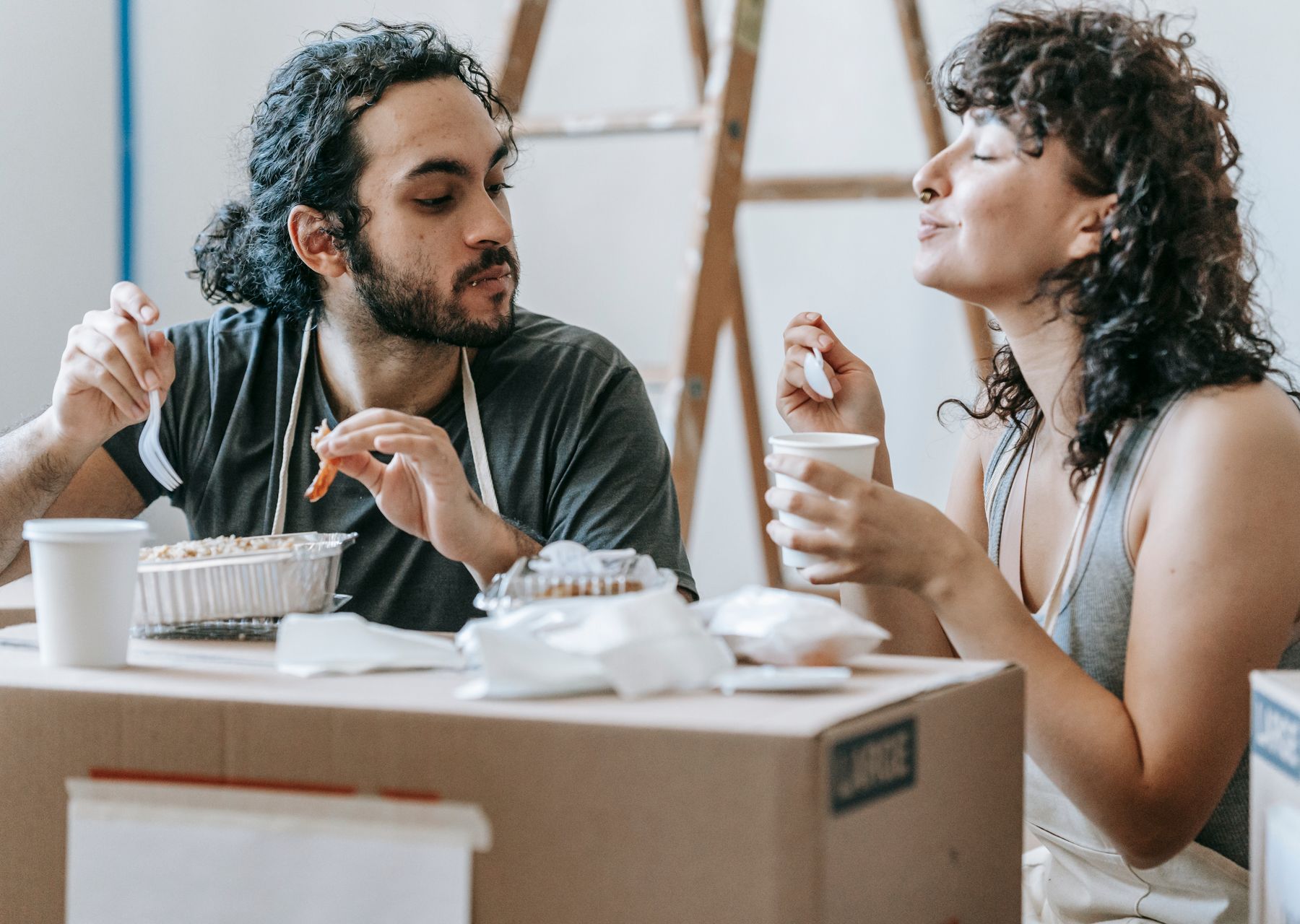 Packing services in Bridgend — crew wrapping and loading on moving day
