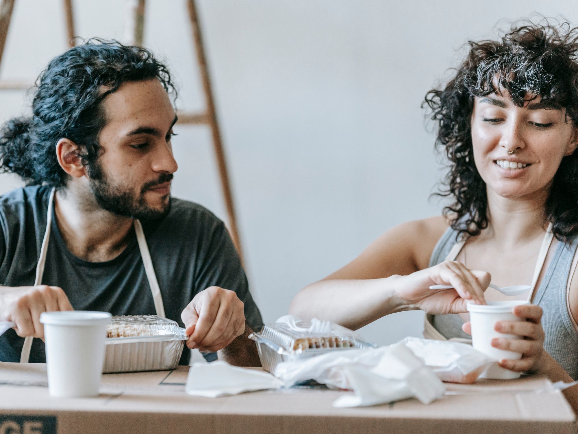 Flat Removals in Tumble, Wales — movers carrying boxes for a flat move