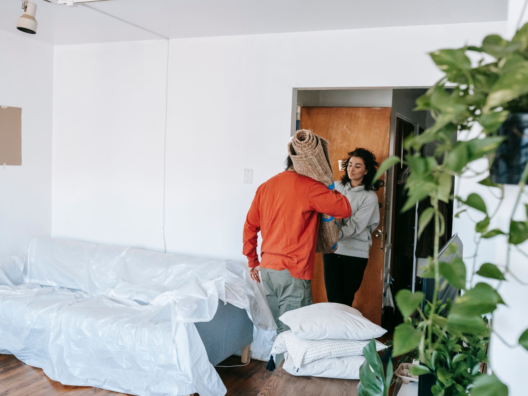 Flat Removals in Glyncorrwg, Wales — movers carrying boxes for a flat move