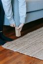 Person Lifting A Couch