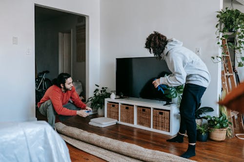 Couple Packing Things Inside The House