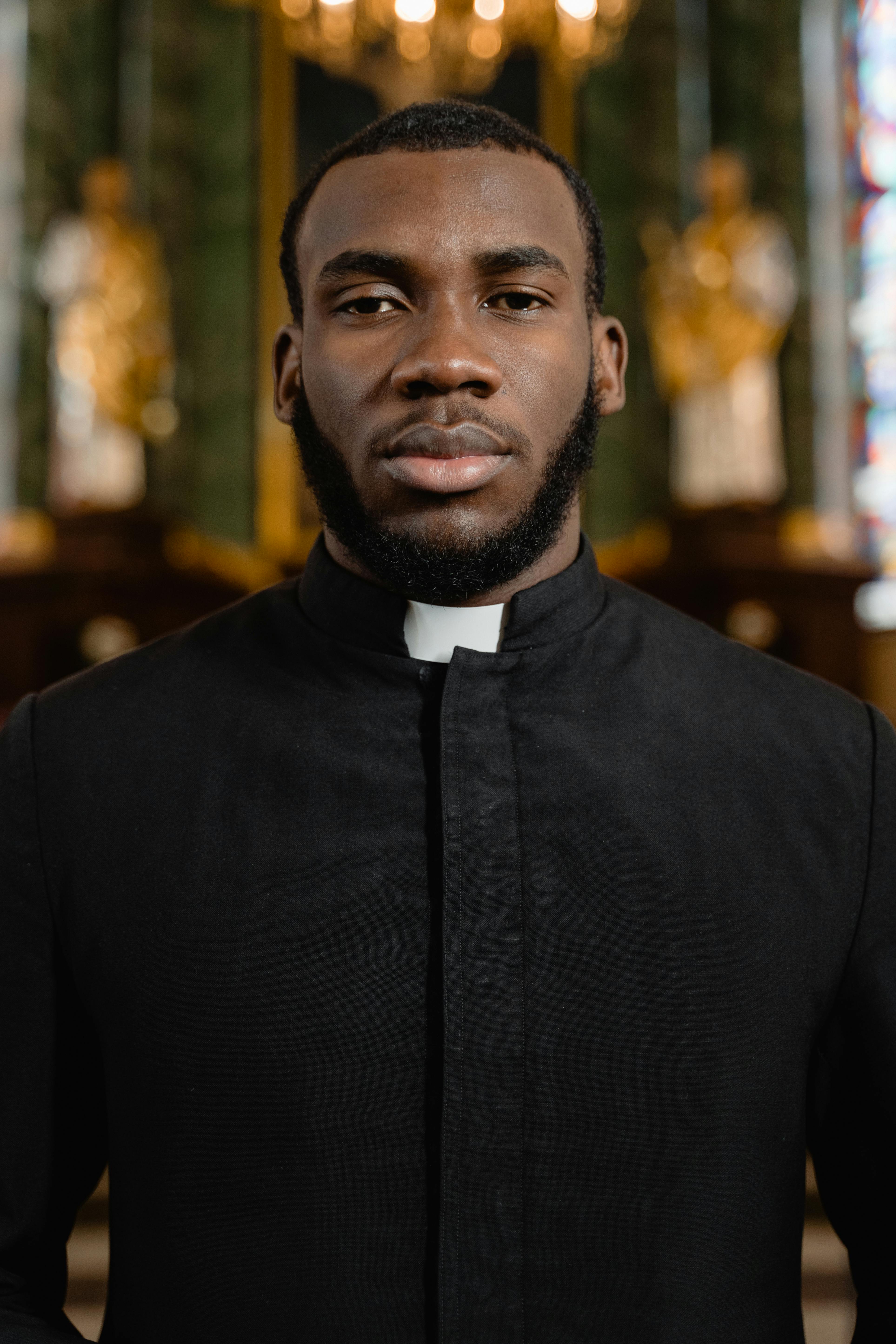 portrait of a priest with facial hair