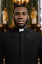 Man in Black Coat Standing
